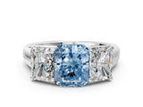 White gold Fancy Blue Radiant Cut Three-Stone Diamond Ring with Prong Setting on a Classic Band_12