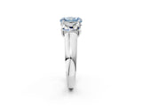 White gold Fancy Blue Radiant Cut Three-Stone Diamond Ring with Prong Setting on a Classic Band_14