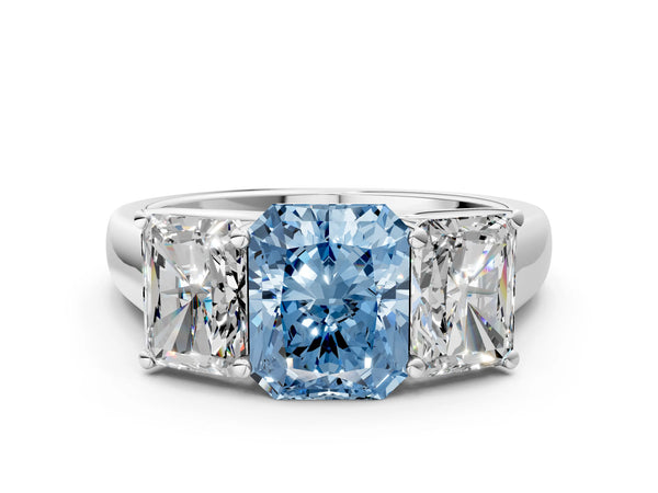 Platinum Fancy Blue Radiant Cut Three-Stone Diamond Ring with Prong Setting on a Classic Band