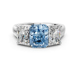 White gold Fancy Blue Radiant Cut Three-Stone Diamond Ring with Prong Setting on a Classic Band_18