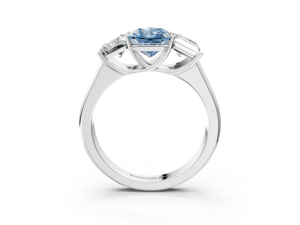 Platinum Fancy Blue Radiant Cut Three-Stone Diamond Ring with Prong Setting on a Classic Band