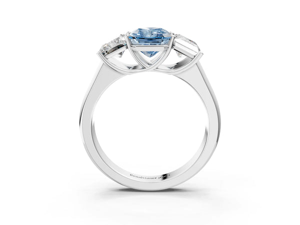 Platinum Fancy Blue Radiant Cut Three-Stone Diamond Ring with Prong Setting on a Classic Band
