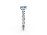 Platinum 5.60 Carat Blue VVS2 Radiant Diamond Prong Setting with Side Stones on a Pave Band