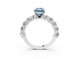 Platinum 5.60 Carat Blue VVS2 Radiant Diamond Prong Setting with Side Stones on a Pave Band