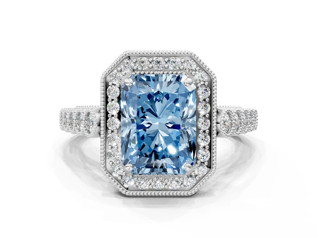 White gold Fancy Blue Radiant  Halo Milgrain Solitaire with Bezel Set Side Stones and Pave Band_32