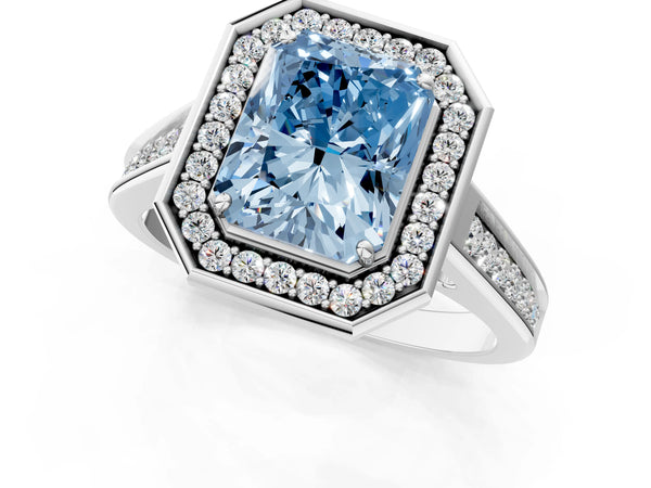 White gold Fancy Blue Radiant  Halo Solitaire Diamond Ring with Pave Band and Bezel Setting