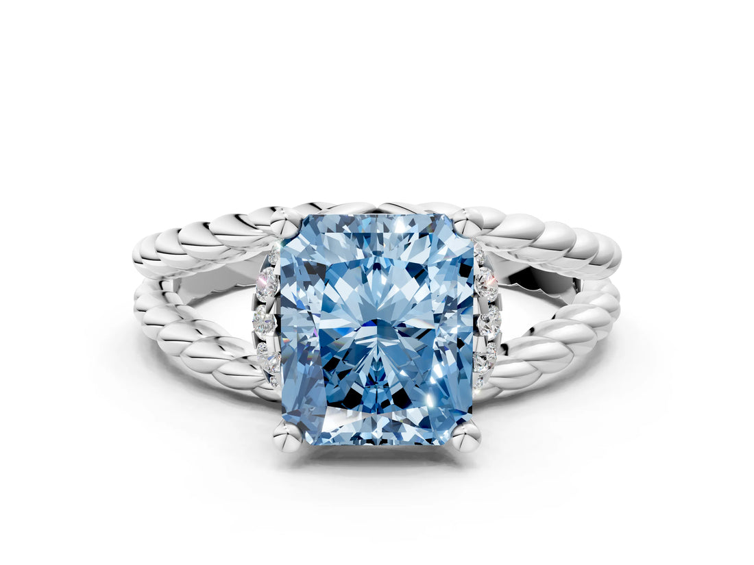 White gold Fancy Blue Radiant  Halo Twisted Band Four-Prong Ring_56