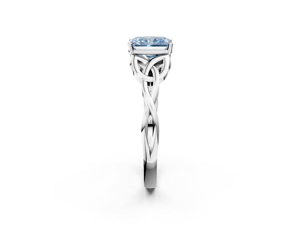 White gold Fancy Blue Radiant Cut Diamond Solitaire Engagement Ring with Celtic Knot Band and Four-Prong Setting