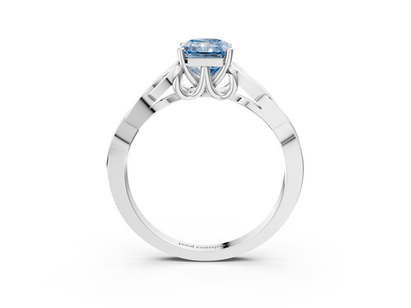 White gold Fancy Blue Radiant Cut Diamond Solitaire Engagement Ring with Celtic Knot Band and Four-Prong Setting