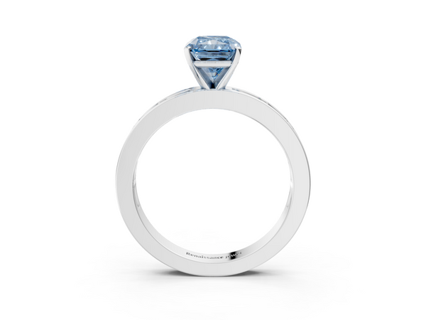 White gold Fancy Blue Radiant  Solitaire Diamond Ring with Channel-Set Baguette Band and Four-Prong Setting