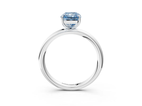 White gold Fancy Blue Radiant  Solitaire Diamond Ring with Four-Prong Setting on a Plain Band