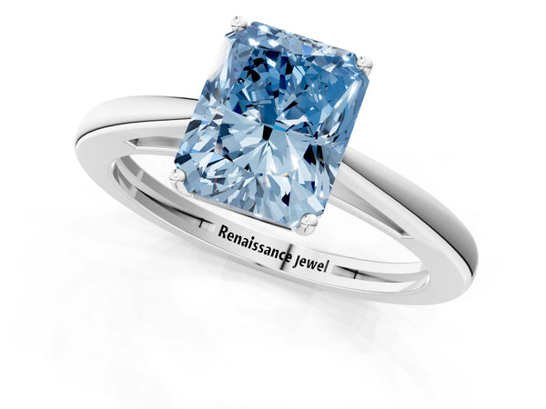 White gold Fancy Blue Radiant  Solitaire Diamond Ring with Split Shank and Four-Prong Setting