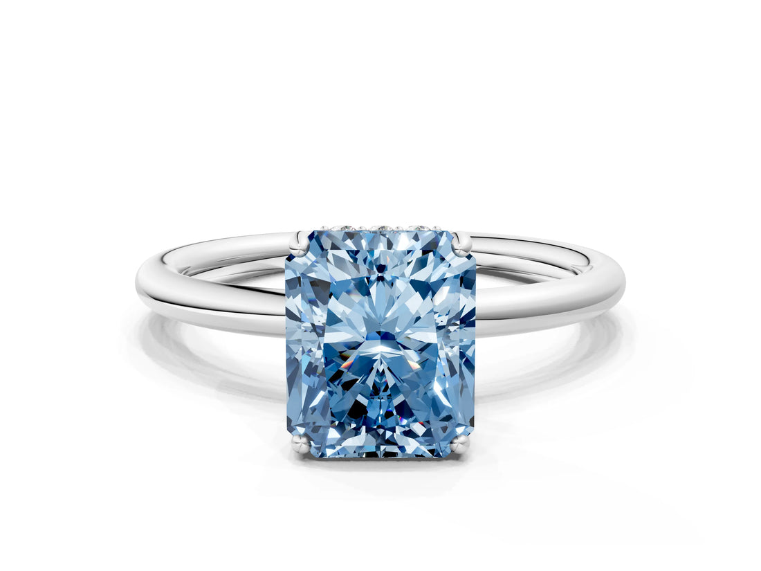White gold Fancy Blue Radiant  Solitaire Diamond Ring with a Classic Band and Four-Prong Setting