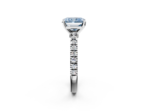 White gold Fancy Blue Radiant  Solitaire Diamond with Pavé Band and Four-Prong Setting