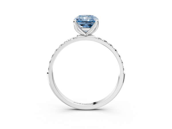 White gold Fancy Blue Radiant Cut Diamond Solitaire Engagement Ring with Round  Pavé Band and Prong Setting