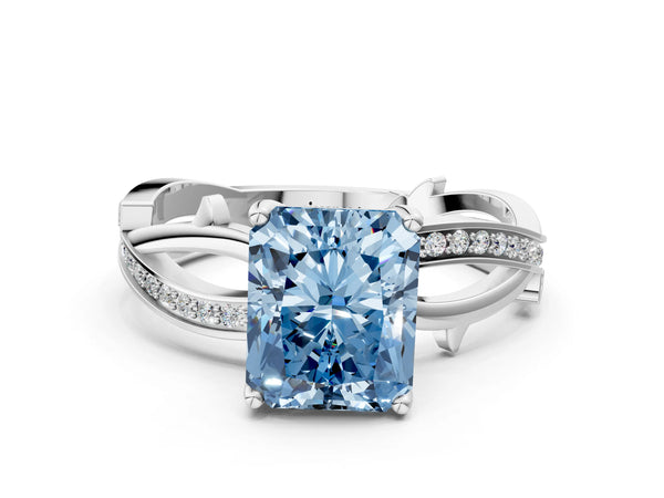 White gold Fancy Blue Radiant  Solitaire Twist Band with Pavé Accents and Four-Prong Setting