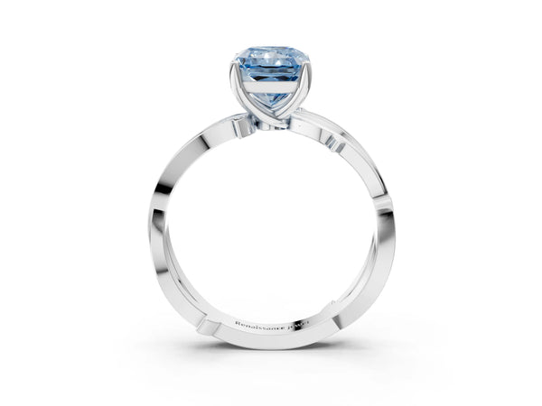 White gold Fancy Blue Radiant  Solitaire Twist Band with Pavé Accents and Four-Prong Setting