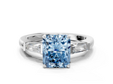 White gold Fancy Blue Radiant  Solitaire with Tapered Baguette Side Stones on a Classic Band with Four-Prong Setting_104