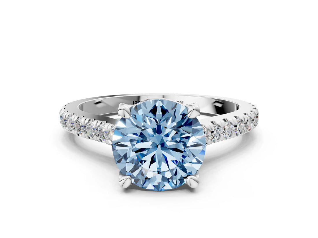 White gold Fancy Blue Round  Brilliant Diamond Solitaire with Pavé Band and Four-Prong Setting