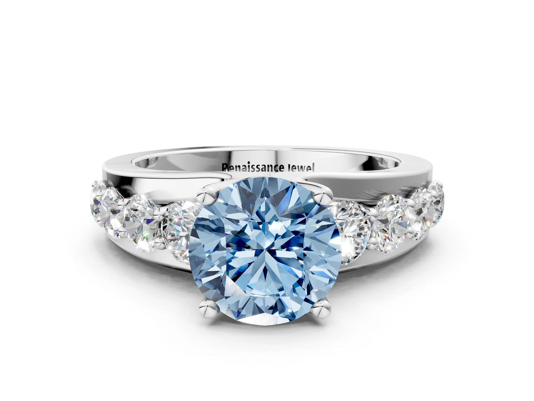 White gold Fancy Blue Round  Brilliant Solitaire with Side Stones on a Pave Band and Four-Prong Setting_120