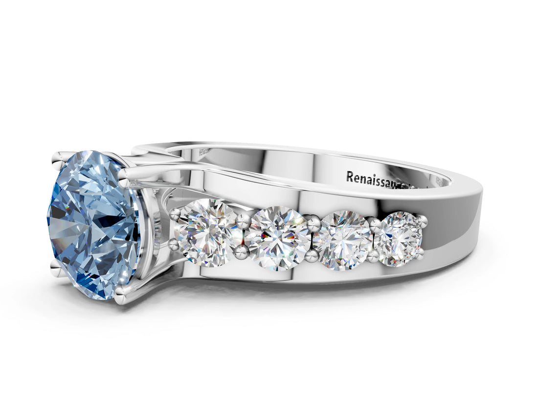 White gold Fancy Blue Round  Brilliant Solitaire with Side Stones on a Pave Band and Four-Prong Setting_168