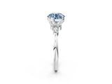 White gold Fancy Blue Round Cut Brilliant Diamond Solitaire Ring with Pear Side Stones and Four-Prong Setting_20