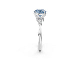 White gold Fancy Blue Round Cut Brilliant Diamond Solitaire Ring with Pear Side Stones and Four-Prong Setting_26