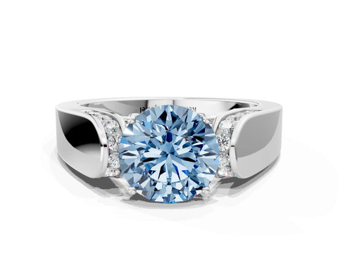 White gold Fancy Blue Round Cut Cut Diamond Channel Set Solitaire Ring with Four-Prong Setting