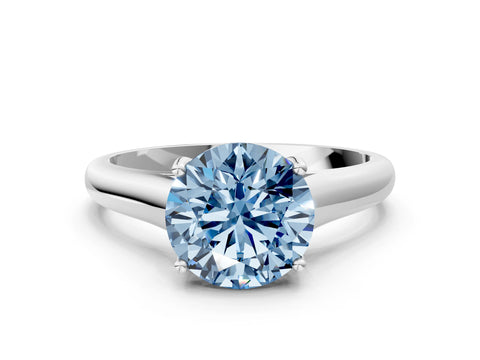 White gold Fancy Blue Round Cut Cut Diamond Solitaire Engagement Ring with Tapered Plain Band and Four-Prong Setting