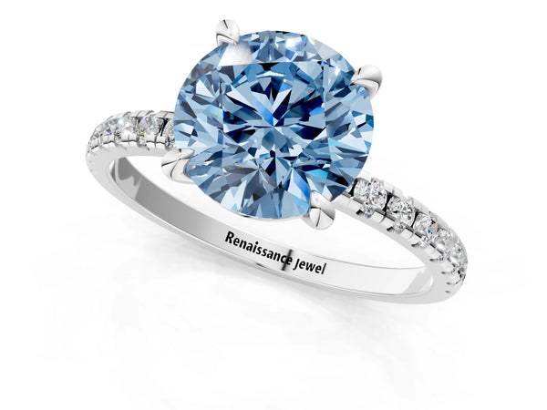 Platinum Fancy Blue Round Cut Diamond Brilliant Solitaire Ring with Pavé Band and Four-Prong Setting