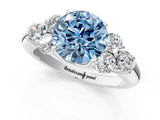 White gold Fancy Blue Round  Cut Diamond Cluster Ring with Round Accent Stones and Prong Setting on a Classic Band_32