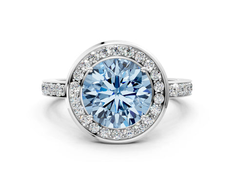 White gold Fancy Blue Round Cut Diamond Halo Ring with Bezel Frame and Pavé Band