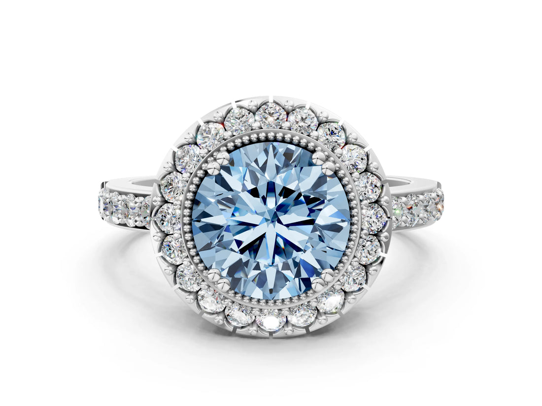 White gold Fancy Blue Round Cut Diamond Halo Ring with Pavé Band and Prong Setting