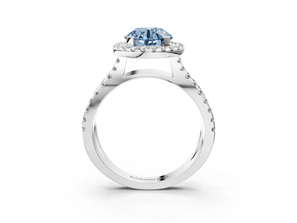 White gold Fancy Blue Round Cut Diamond Halo Ring with Split Shank Pavé Band and Prong Setting