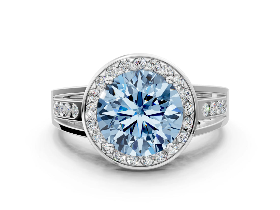 White gold Fancy Blue Round Cut Diamond Halo Ring with Split Shank and Bezel Accents and Prong Setting