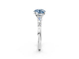 White gold Fancy Blue Round  Cut Diamond Ring with Baguette Side Stones, Channel Set Band, and Four-Prong Setting_14