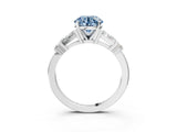 White gold Fancy Blue Round  Cut Diamond Ring with Baguette Side Stones, Channel Set Band, and Four-Prong Setting_15