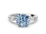 White gold Fancy Blue Round  Cut Diamond Ring with Baguette Side Stones, Channel Set Band, and Four-Prong Setting_3