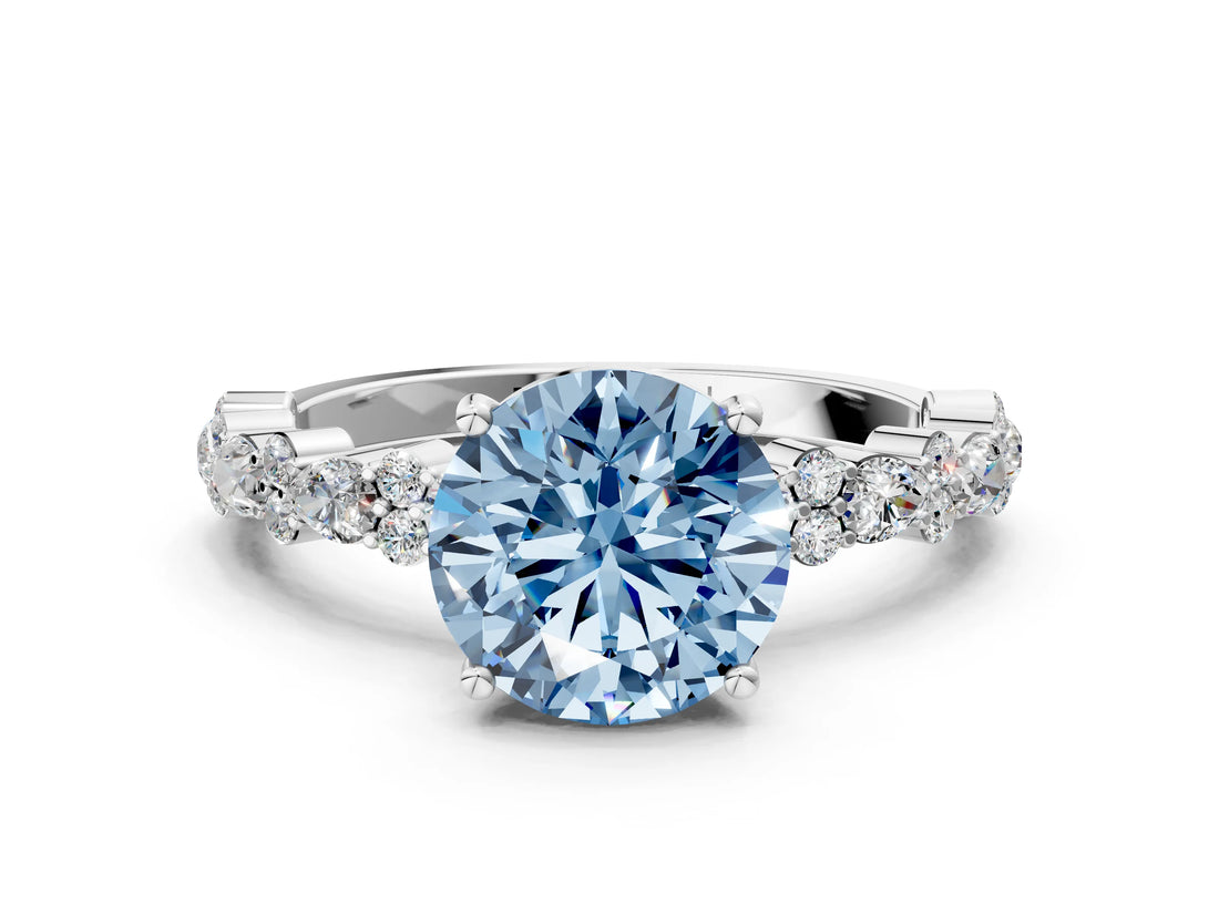 White gold Fancy Blue Round Cut Diamond Side Stone Solitaire Ring with Round  and Four-Prong Setting_134
