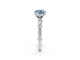 White gold Fancy Blue Round Cut Diamond Side Stone Solitaire Ring with Round  and Four-Prong Setting_135
