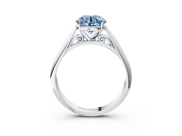 White gold Fancy Blue Round Cut Diamond Solitaire Engagement Ring with Cathedral Setting and Four-Prong Mount