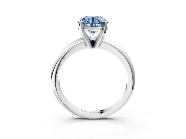 White gold Fancy Blue Round Cut Diamond Solitaire Engagement Ring with Round Band and Four-Prong Setting