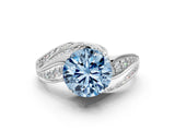 White gold Fancy Blue Round Cut Diamond Solitaire Ring with Prong Setting and Twisted Pavé Band