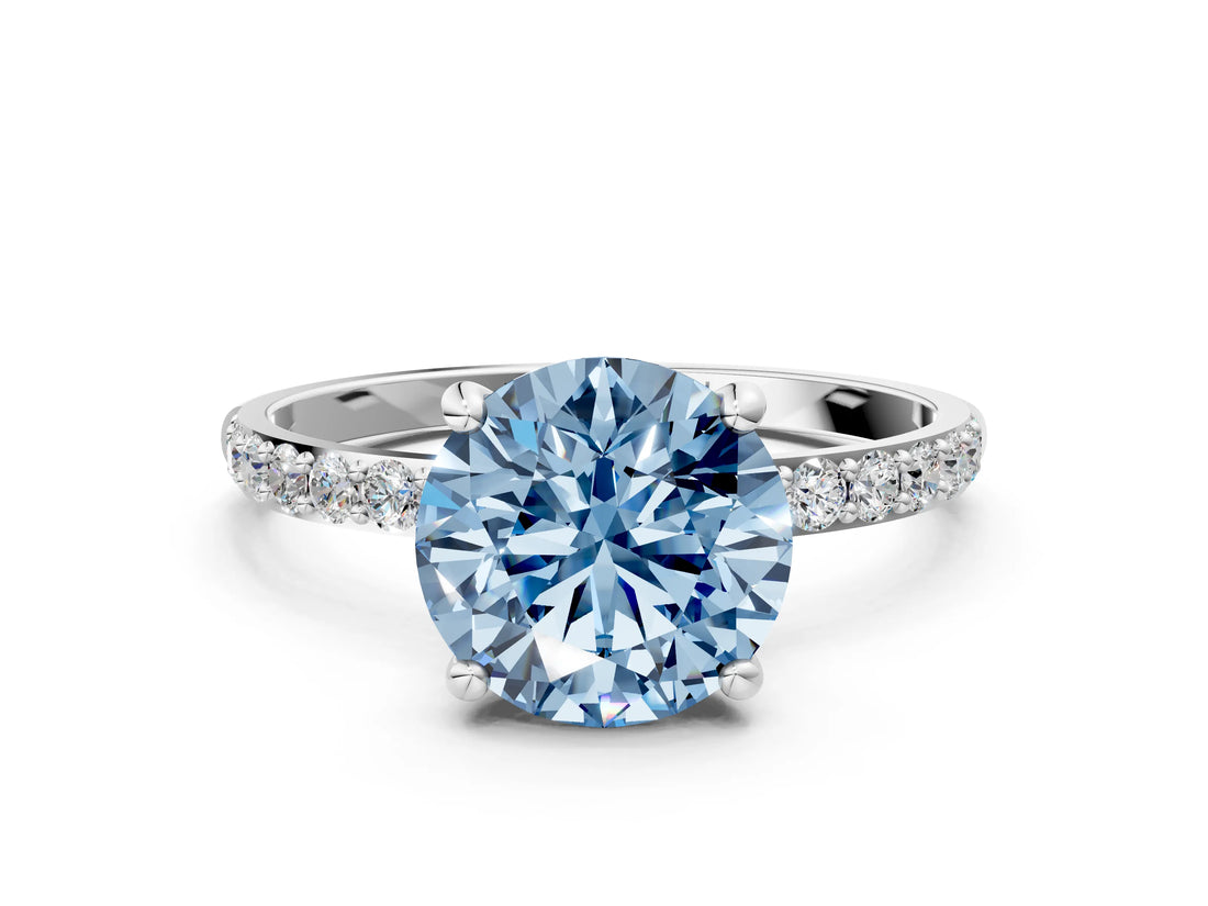 White gold Fancy Blue Round Cut Diamond Solitaire Ring with Round  Pavé Band and Prong Setting_157
