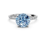 White gold Fancy Blue Round Cut Diamond Solitaire Ring with Round  Pavé Band and Prong Setting_157