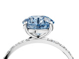 White gold Fancy Blue Round Cut Diamond Solitaire Ring with Round  Pavé Band and Prong Setting_161