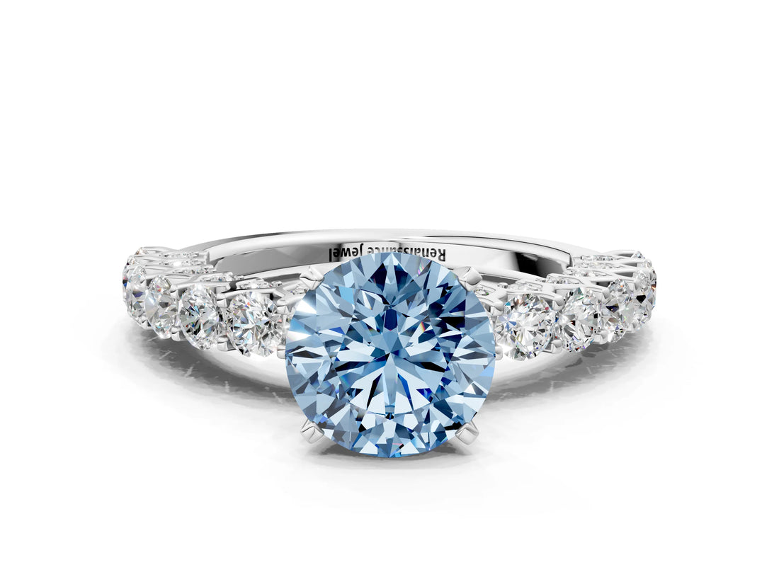 White gold Fancy Blue Round Cut Diamond Solitaire Ring with Shared Prong Pavé Band and Four-Prong Setting_58