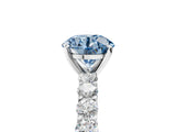 White gold Fancy Blue Round Cut Diamond Solitaire Ring with Shared Prong Pavé Band and Four-Prong Setting_63