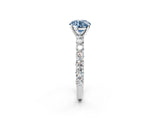 White gold Fancy Blue Round Cut Diamond Solitaire Ring with Shared Prong Pavé Band and Four-Prong Setting_65