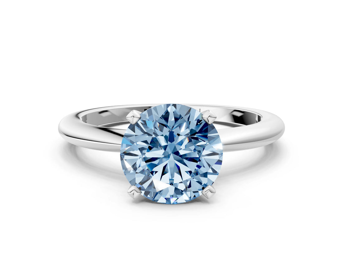 White gold Fancy Blue Round Cut Diamond Solitaire Ring with Six-Prong Setting and Classic Band_286